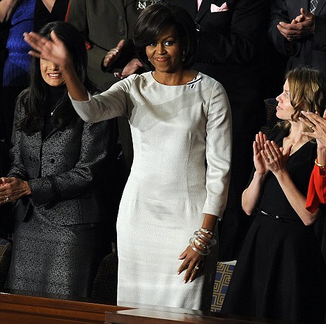 'I wear what I like' Michelle Obama hits back after U.S. designers criticise Alexander McQueen dress - Michelle Obama