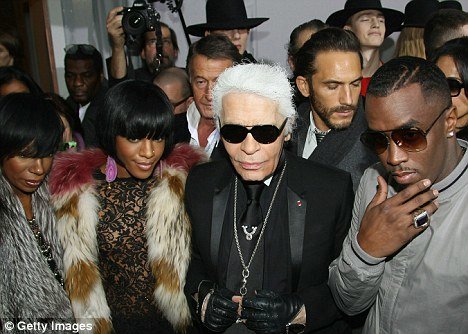 Last train to Paris: P Diddy rubs shoulders with Karl Lagerfeld as he plugs new album in France  and checks out Fashion Week