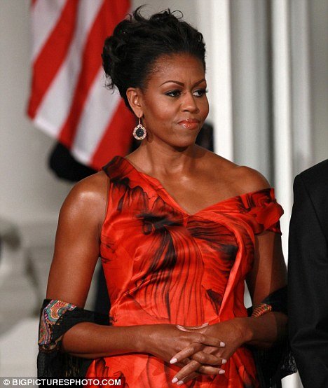 'I wear what I like' Michelle Obama hits back after U.S. designers criticise Alexander McQueen dress