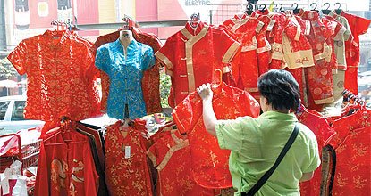 Fashion victims: Colour-coded politics has left Yaowarat devoid of red T-shirts ahead of the Lunar New Year