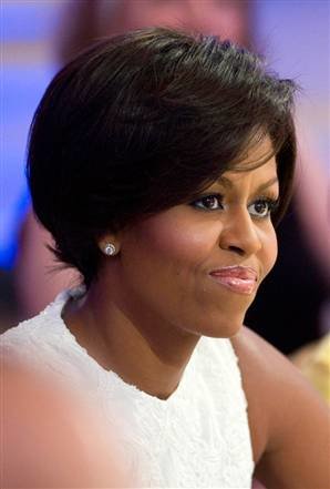 Michelle Obama shows off new hairdo