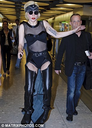 Well it was bound to happen... Lady Gaga takes a tumble thanks to her ridiculous choice of footwear - Lady Gaga