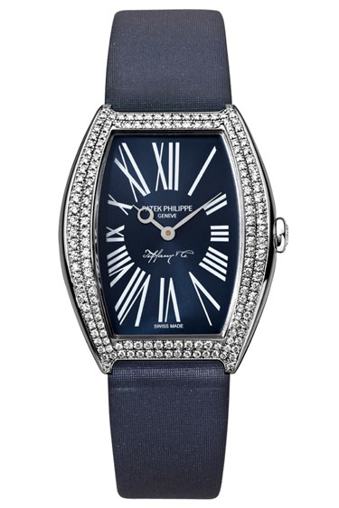 Feminine - Patek Philippe watch, Tiffany & Co.; 800-526-0649.