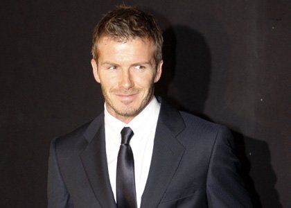 David Beckham Checks Out Armani Fashions